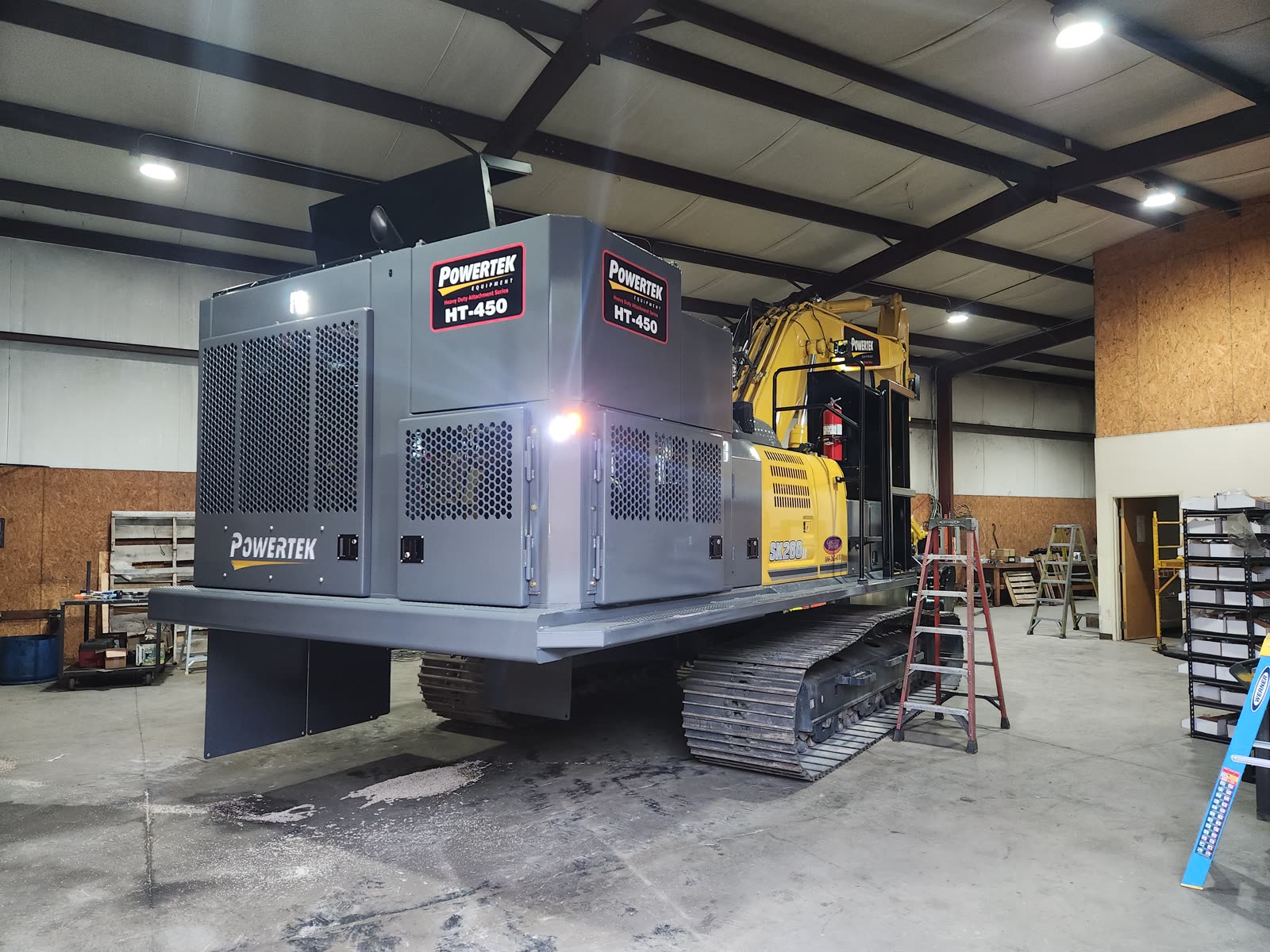 Powertek HT-450 power pack on a Kobelco SK260 inside the Concord shop during final checks