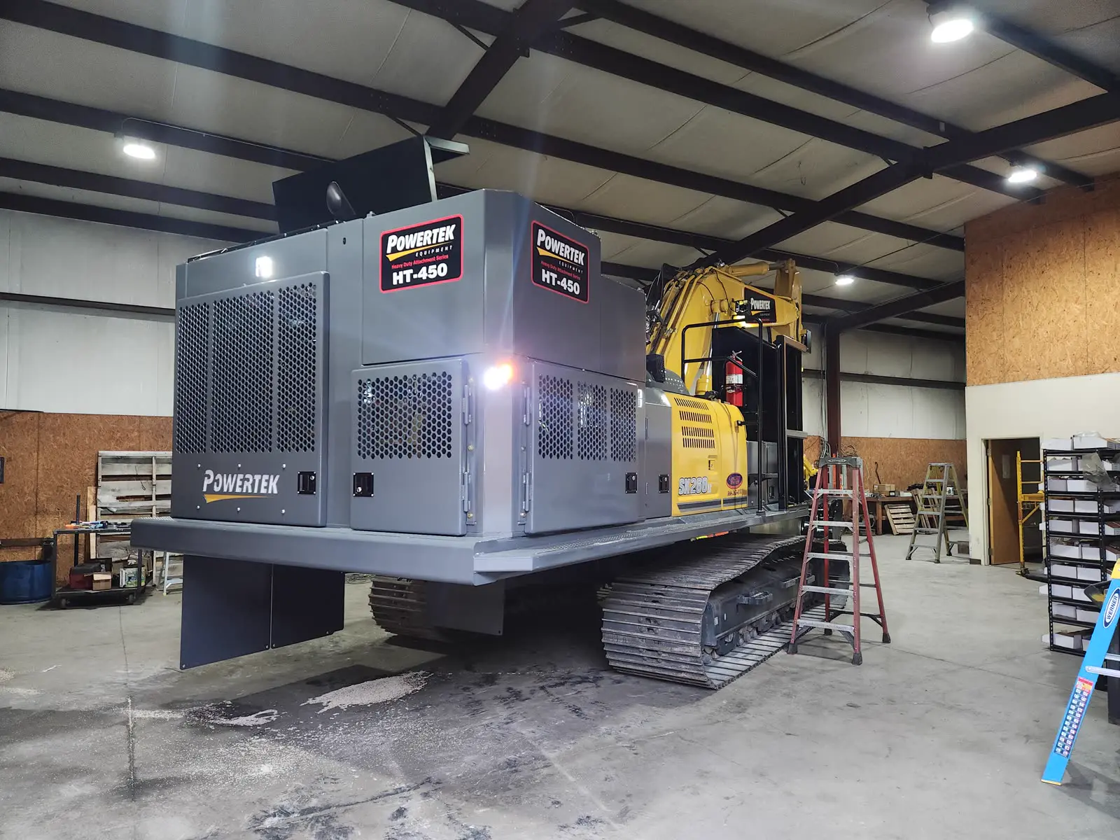 Powertek HT-450 power pack on a Kobelco SK260 inside the Concord shop during final checks